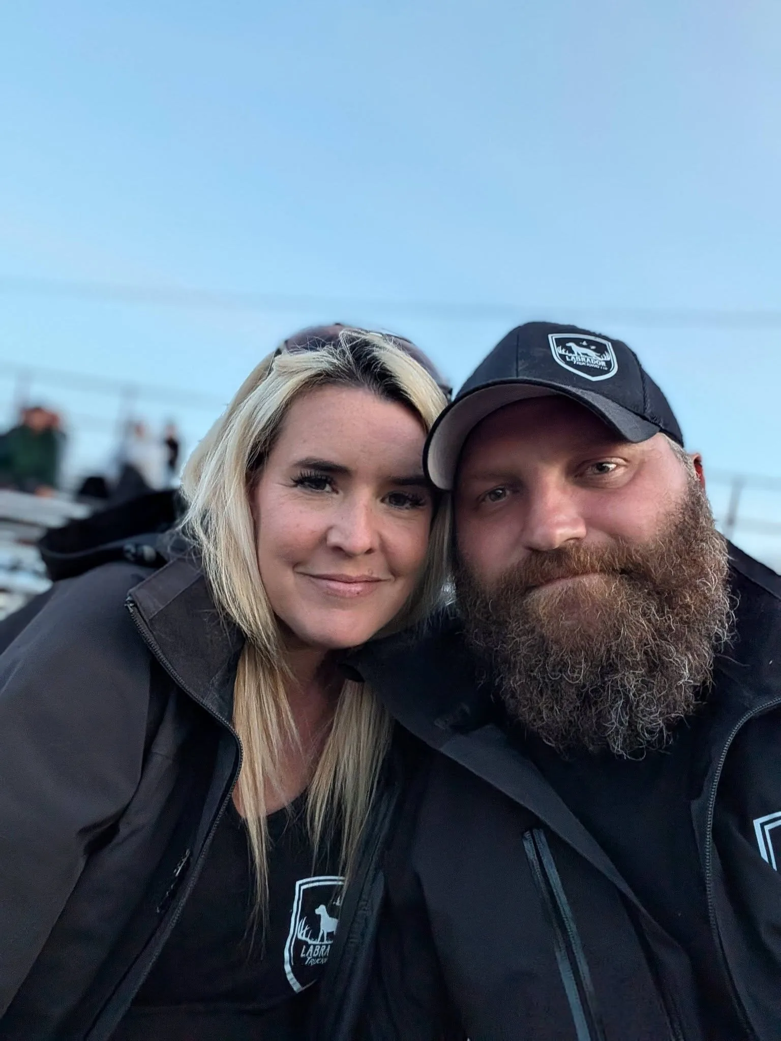 Aaron and Kristy Clark wearing Labrador Trucking gear