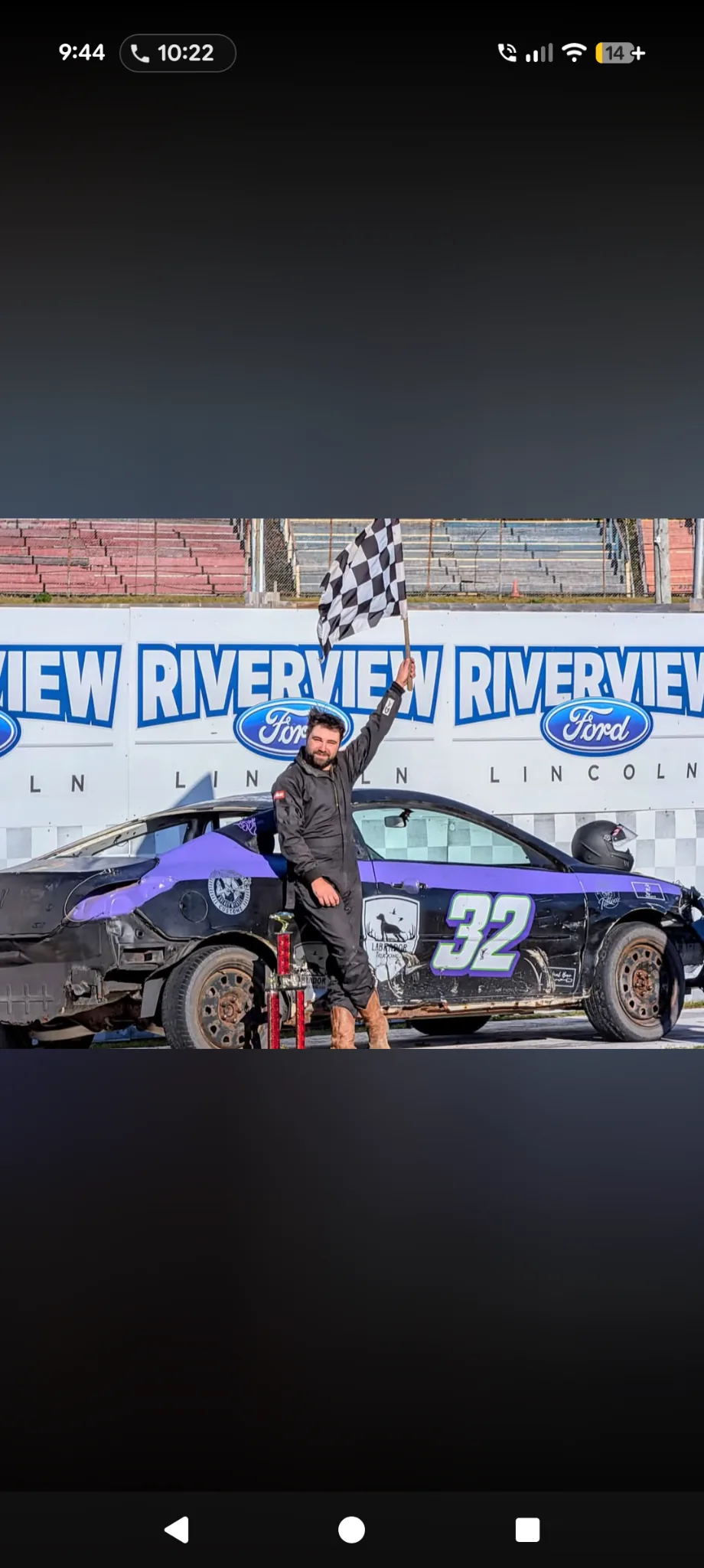 Dylan Phillips with the Labrador Trucking sponsored number 32 race car