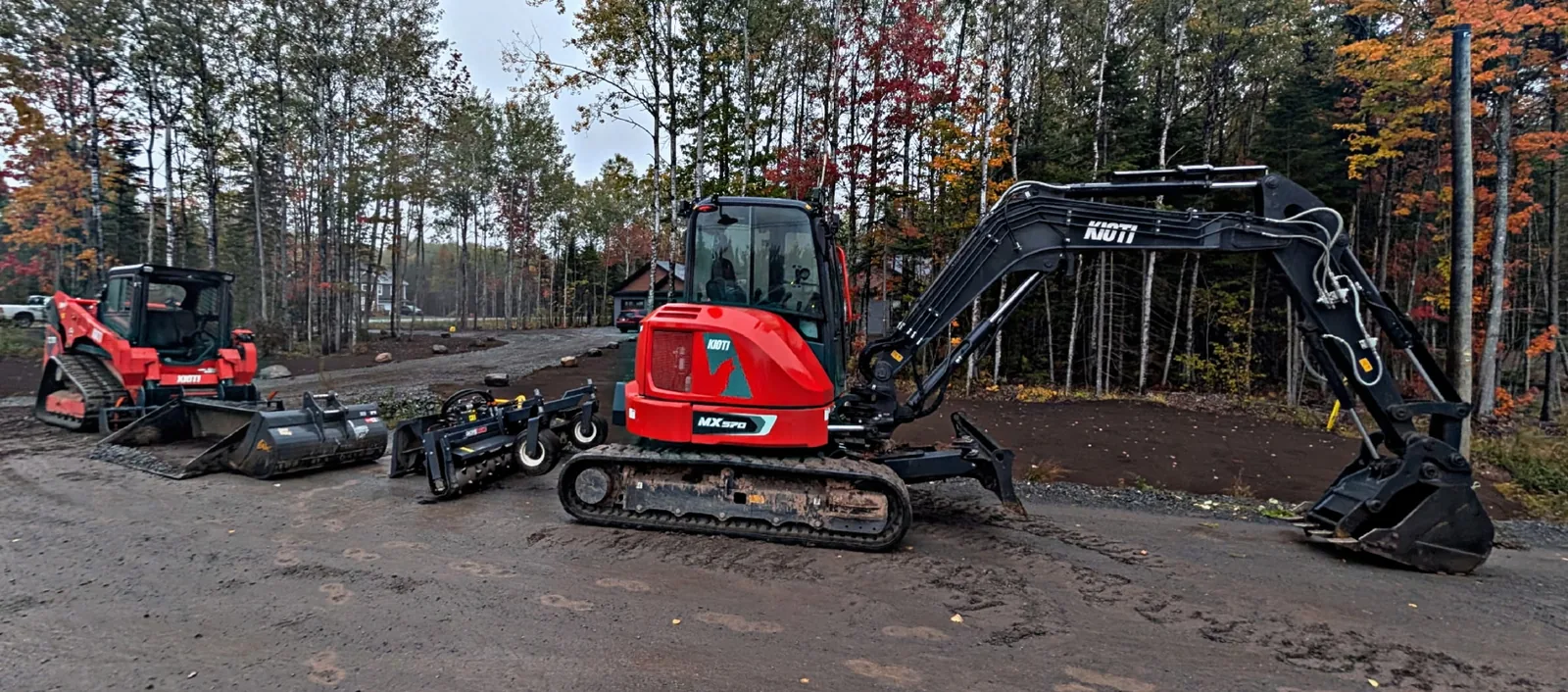 KIOTI excavator, compact track loader and attachments at a Labrador Trucking job site